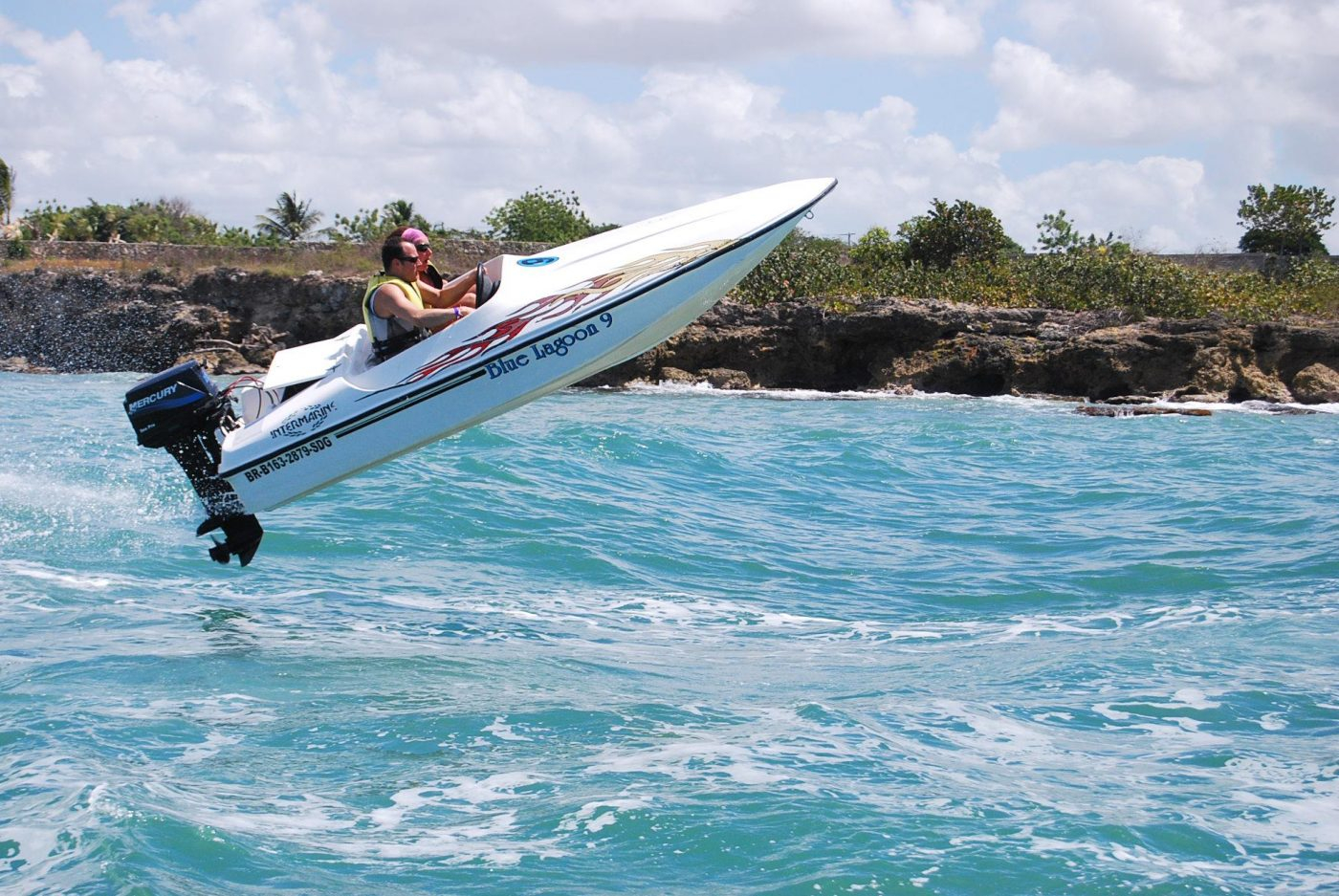  A man and woman in a fast boat