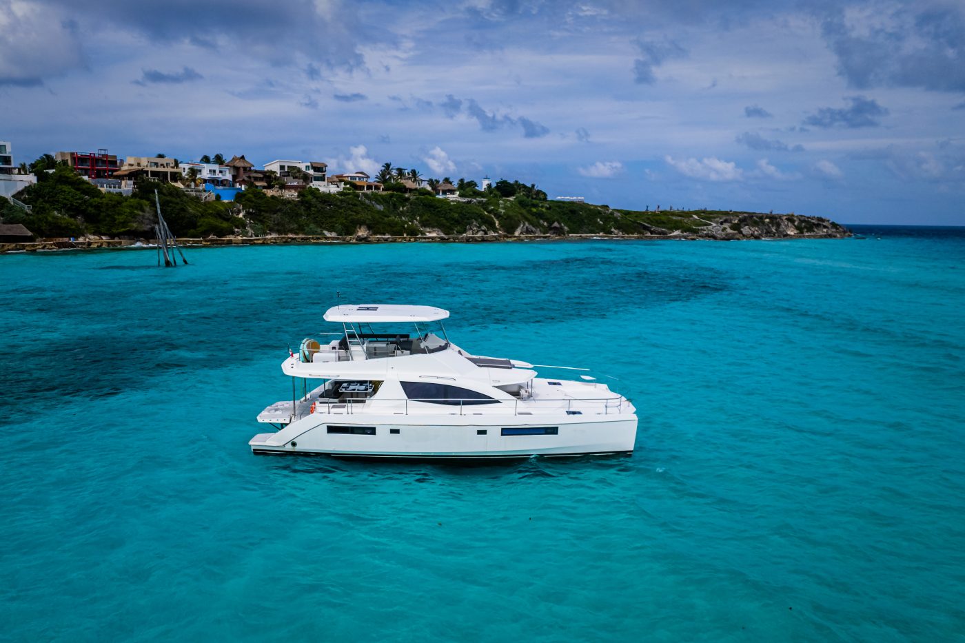 Leopard Catamaran for Luxury Yacht Charters from Cancun view side